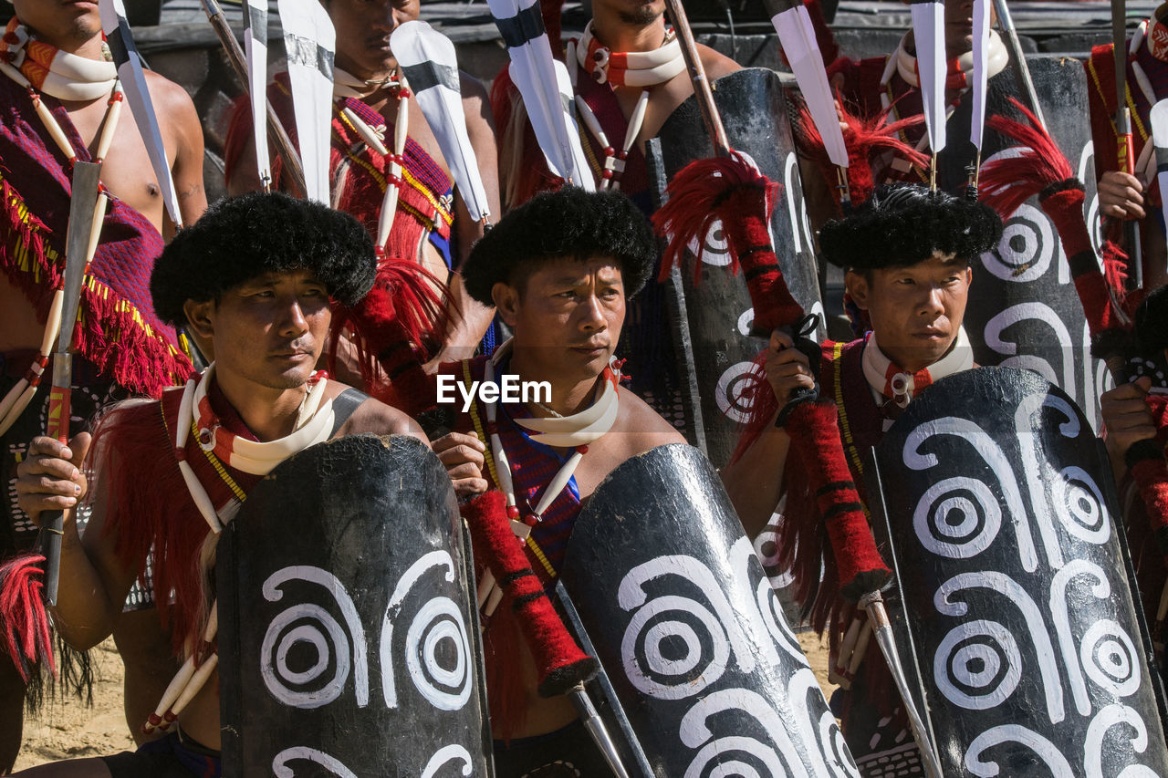 GROUP OF PEOPLE IN TRADITIONAL CLOTHING