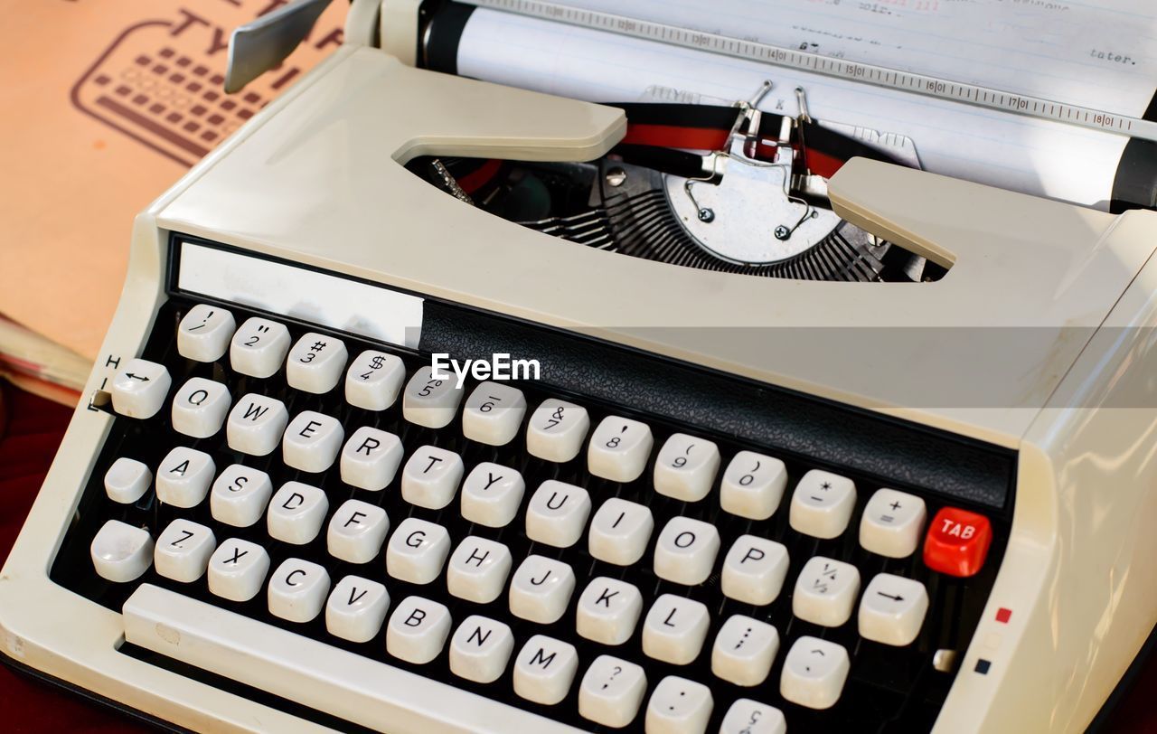 CLOSE-UP OF OLD KEYBOARD