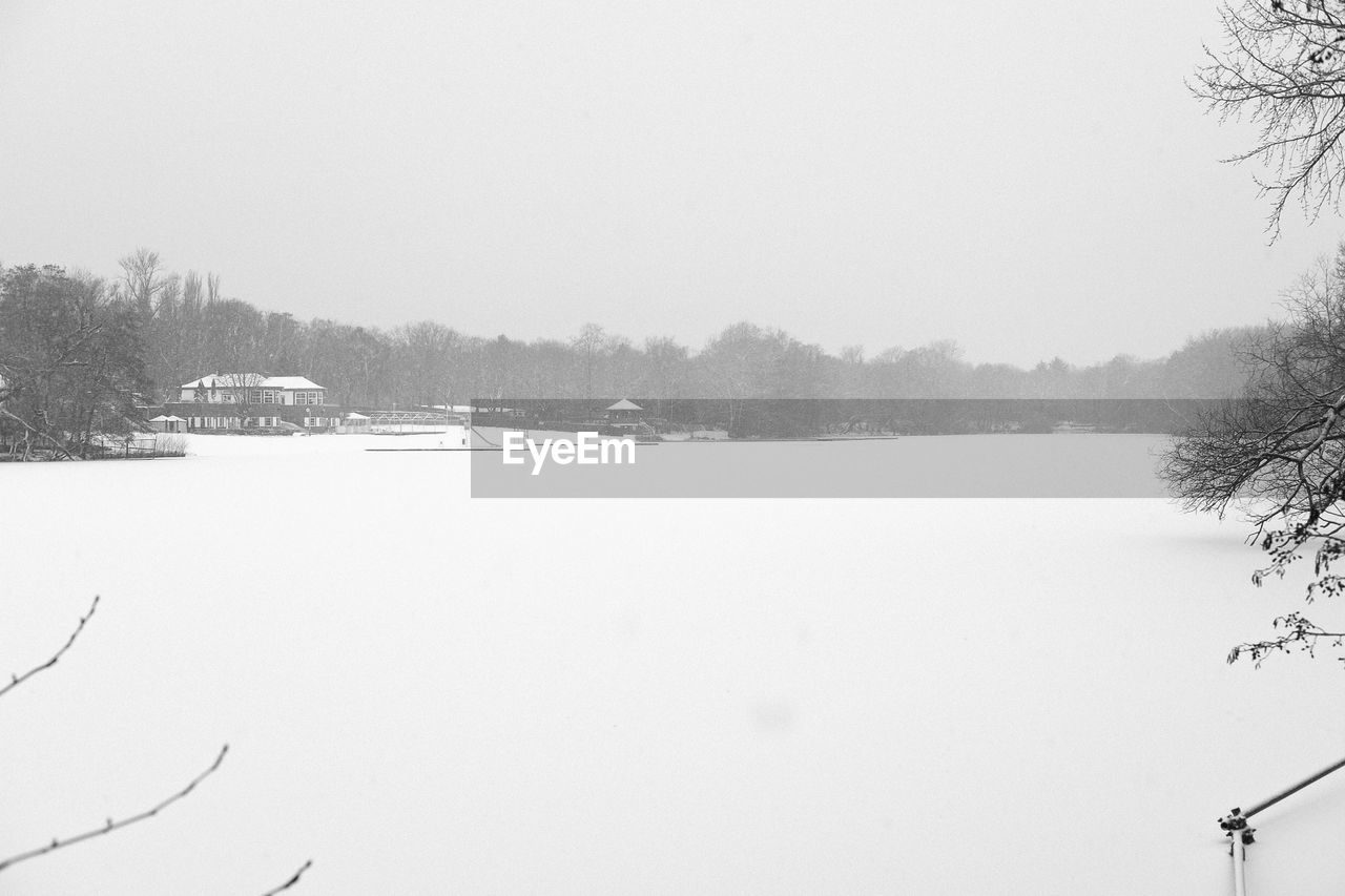 Scenic view of frozen lake against sky