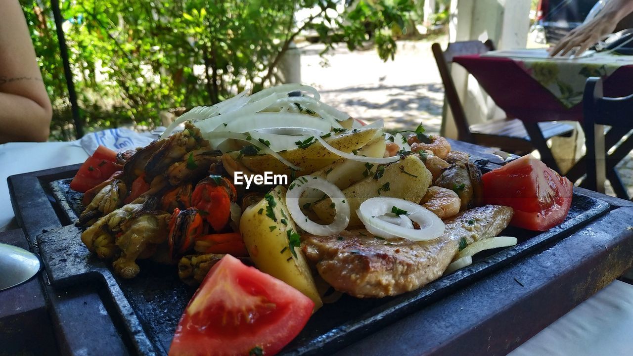 CLOSE-UP OF FRUITS AND TABLE