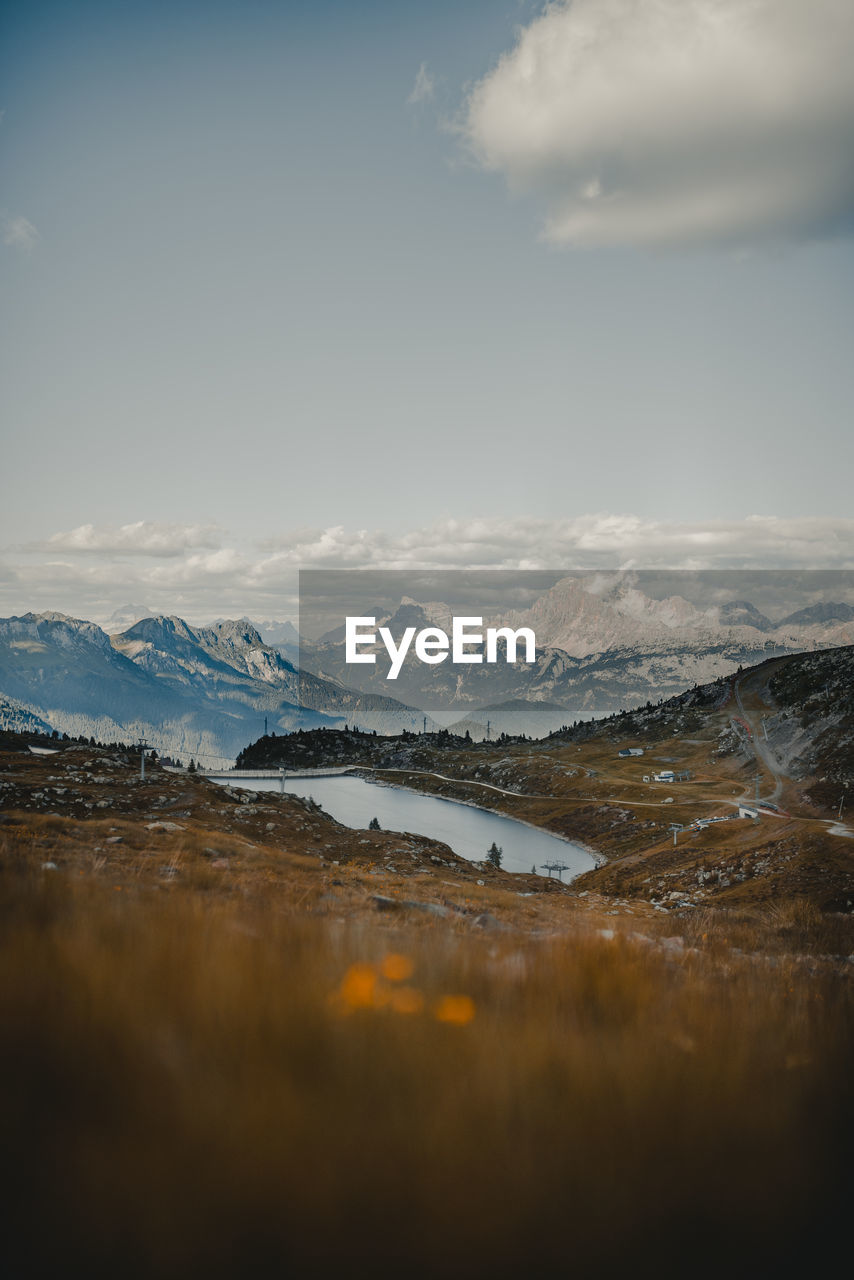 Scenic view of snowcapped mountains against sky