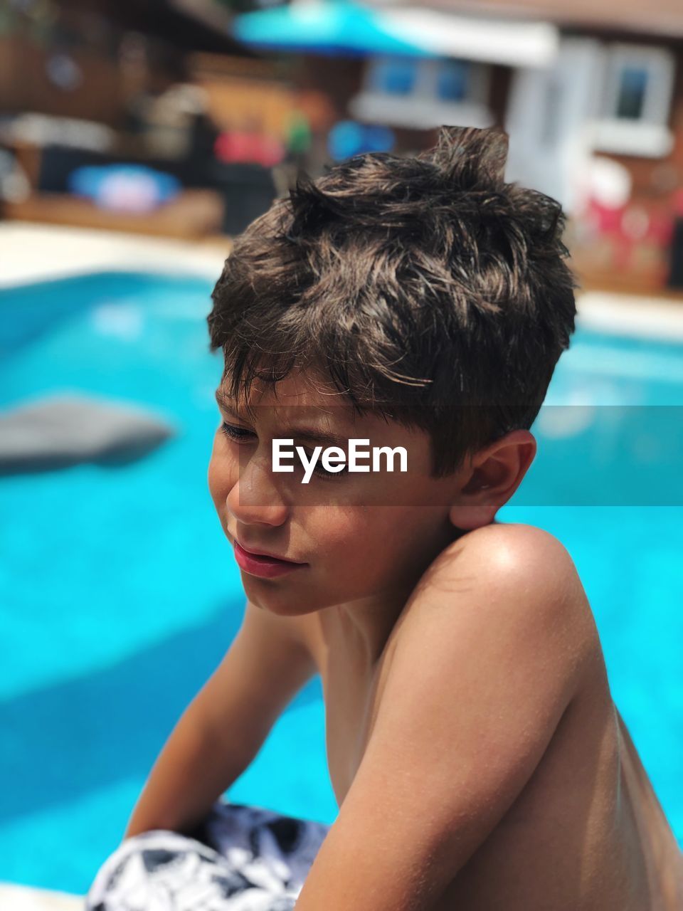 Close-up of young man  in swimming pool