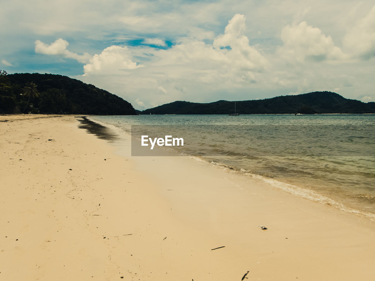 Scenic view of beach against sky