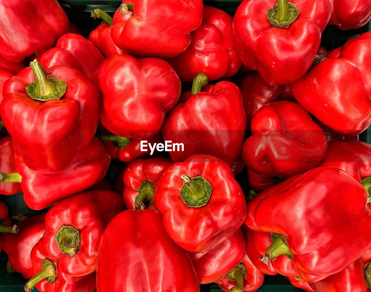 FULL FRAME SHOT OF RED BELL PEPPERS FOR SALE