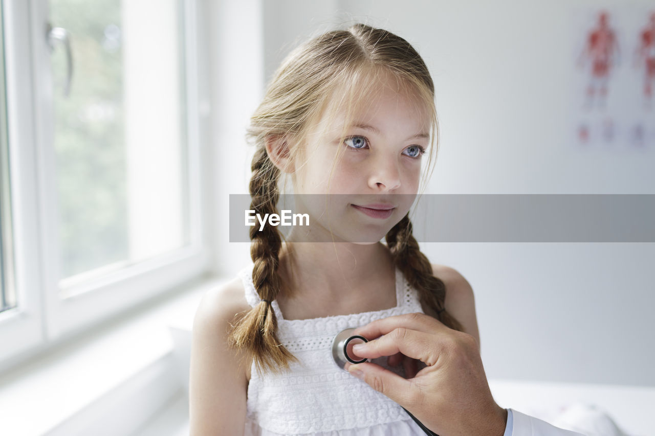 Portrait of girl in window