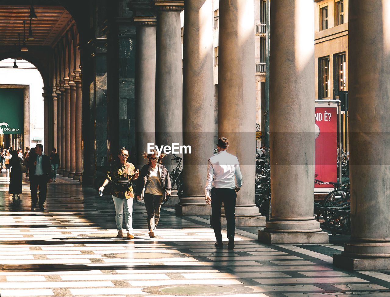 PEOPLE WALKING IN BUILDING