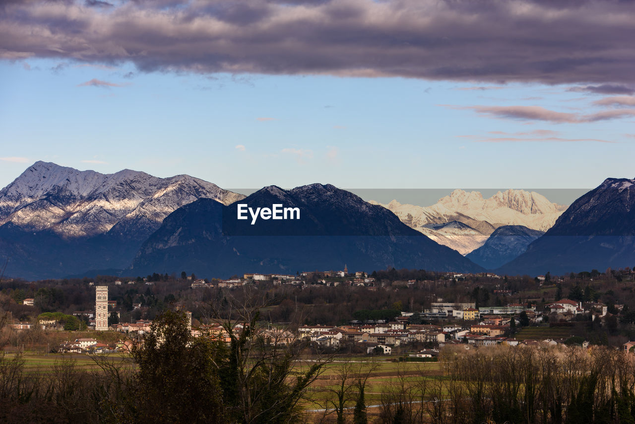 VIEW OF TOWNSCAPE AND MOUNTAINS