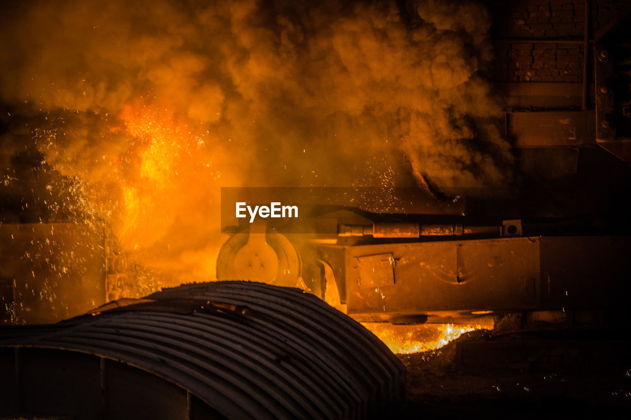 Fire in factory at night