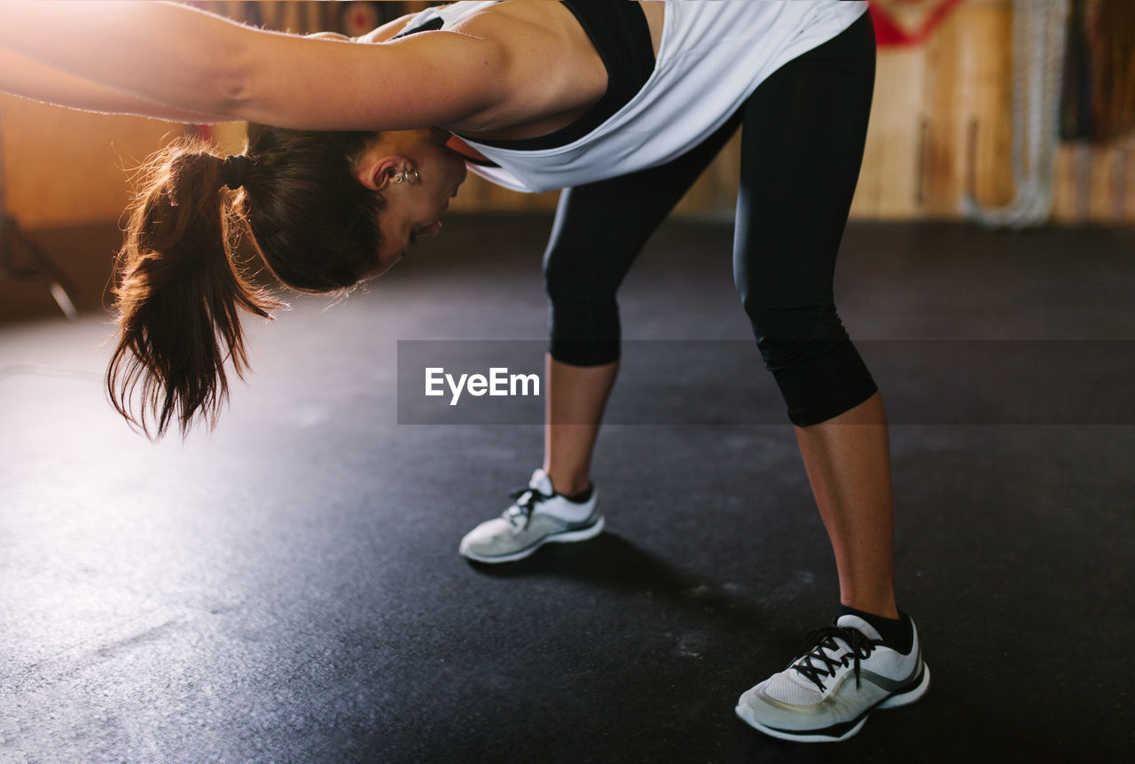 Woman exercising in gym