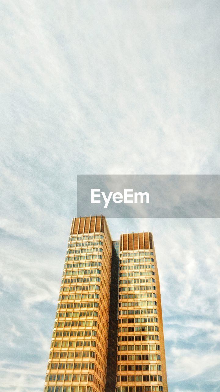 Low angle view of modern building against sky