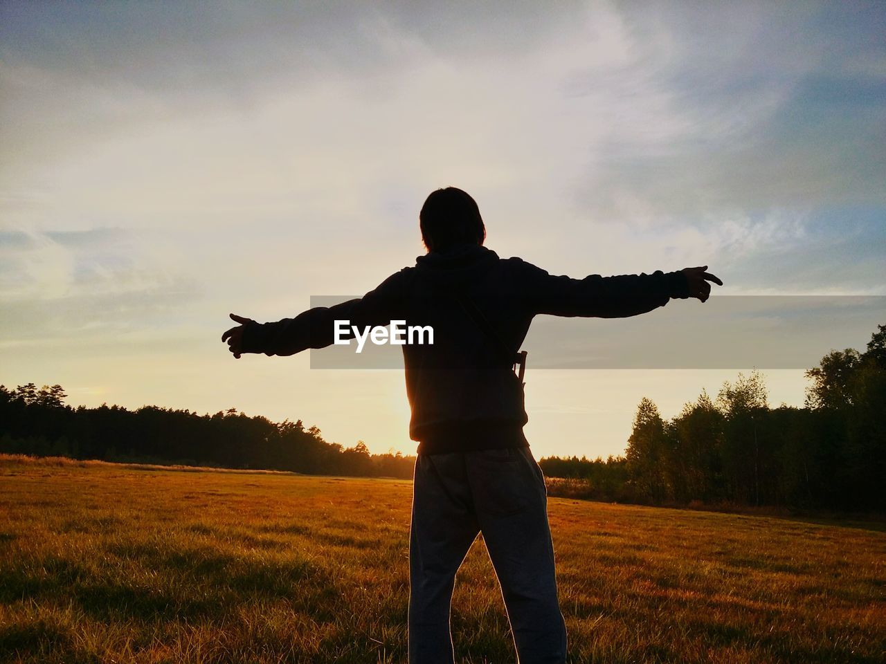 Man standing on countryside landscape