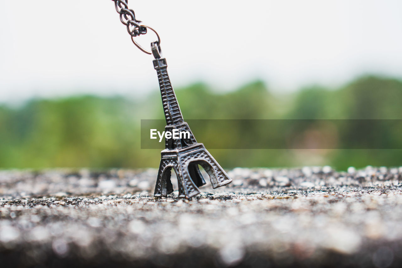 Close-up of eiffel tower decoration on field