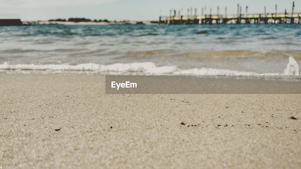 Close up view of sand and ocean