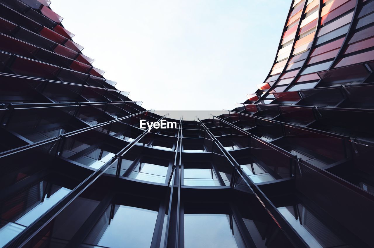 Low angle view of modern building against clear sky