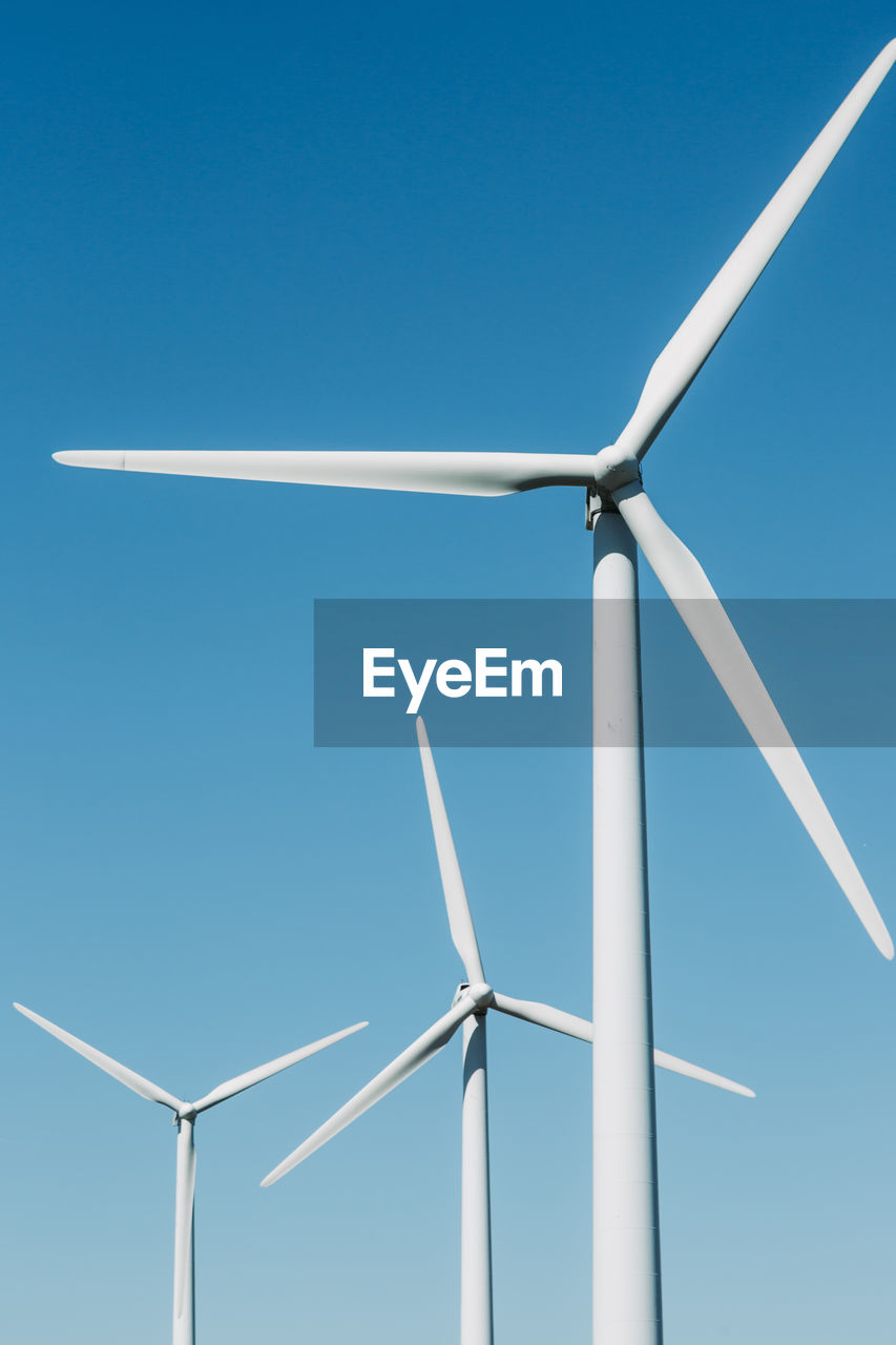 low angle view of windmill against clear sky