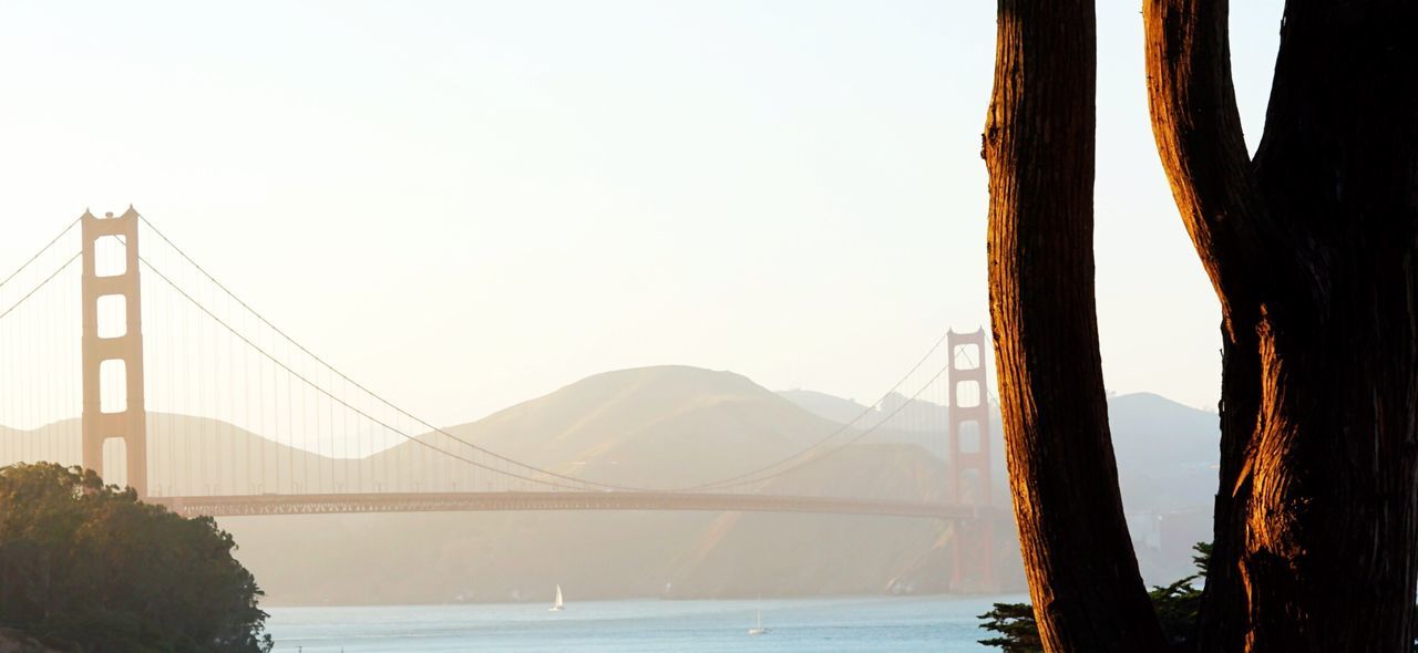 Golden gate bridge against sky in foggy weather