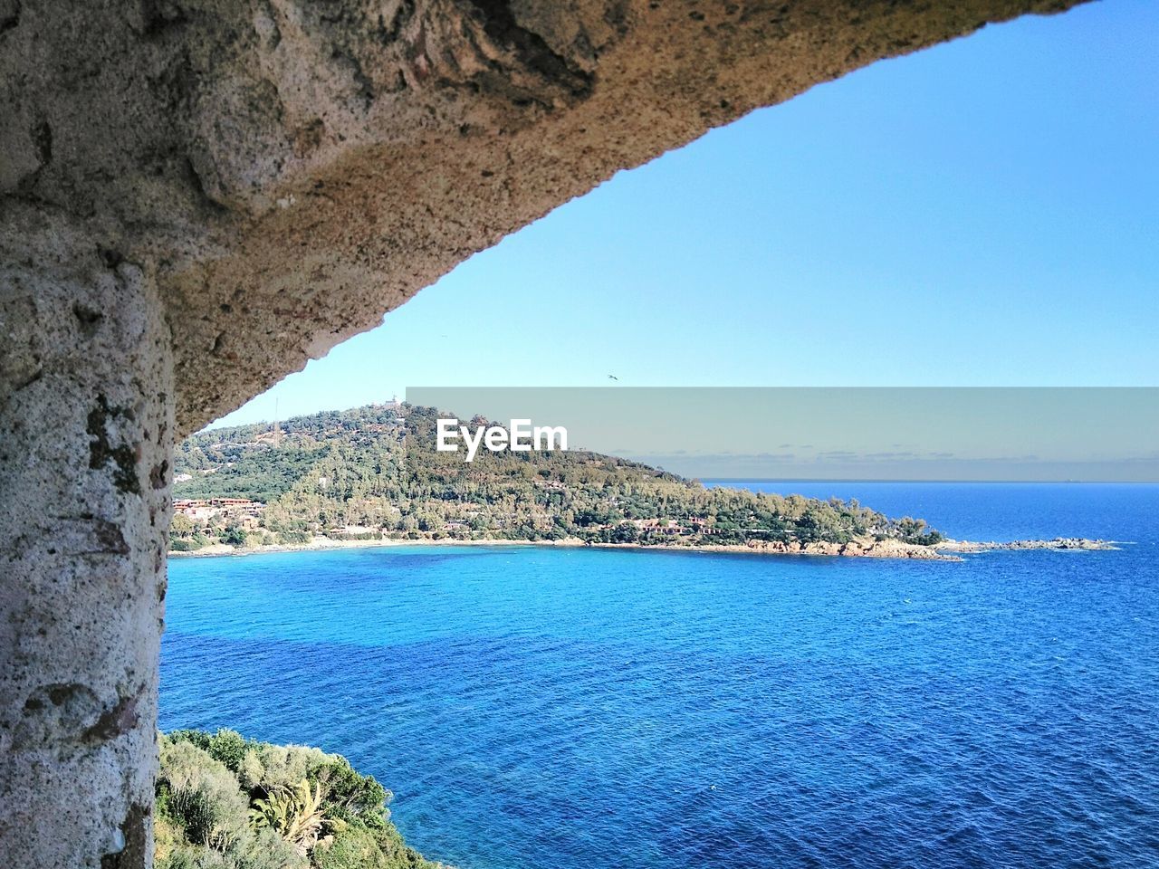 Scenic view of sea against sky seen from torre di san gemiliano