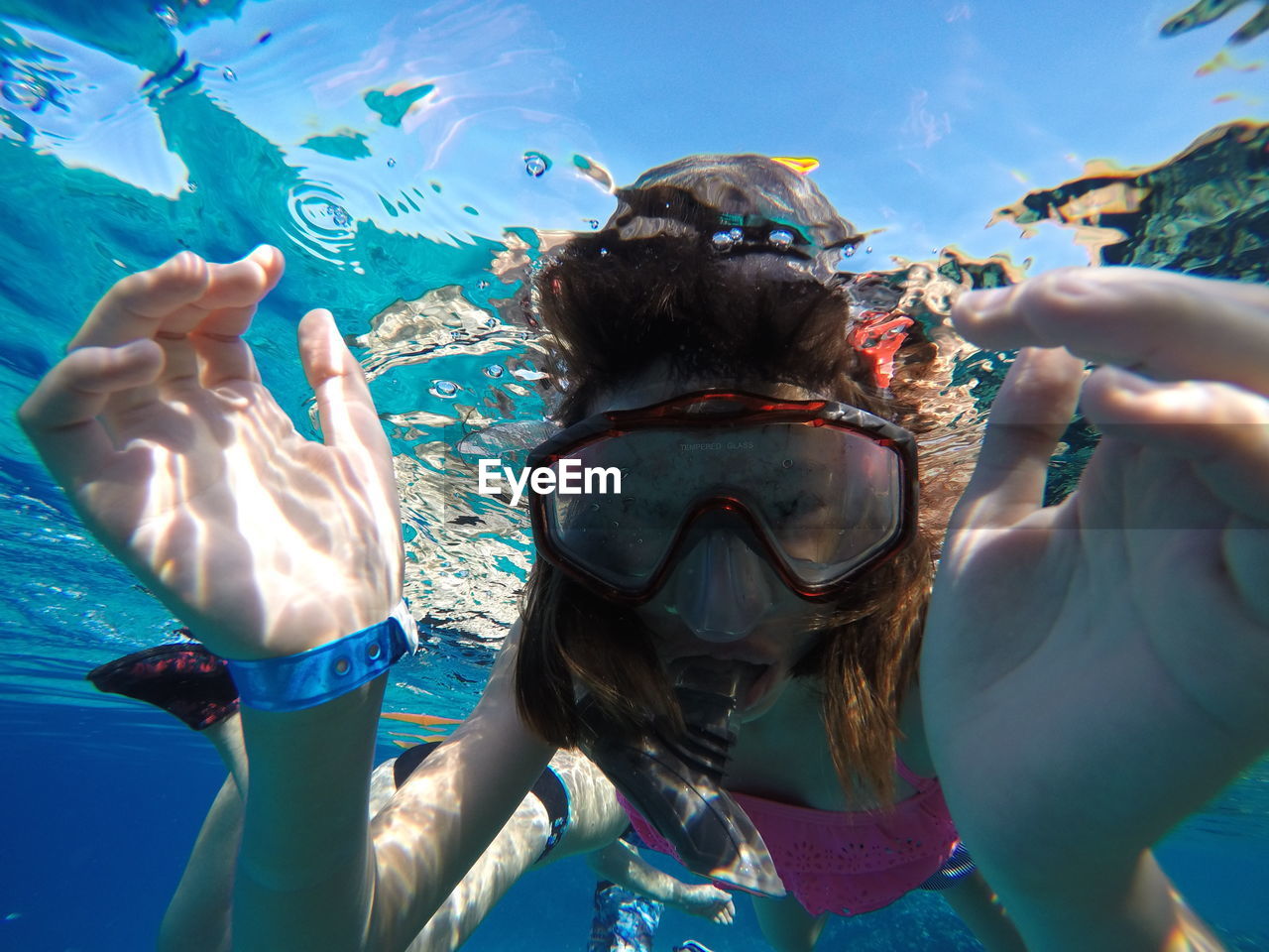 Girl swimming in sea