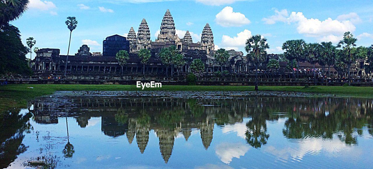 REFLECTION OF TEMPLE ON WATER IN FOUNTAIN