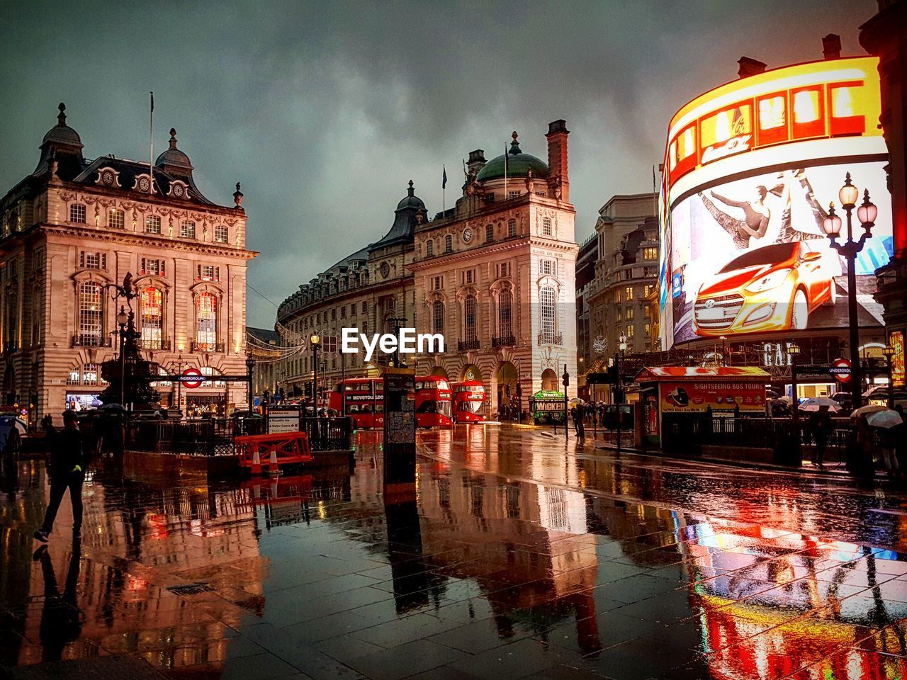 REFLECTION OF BUILDINGS IN WATER