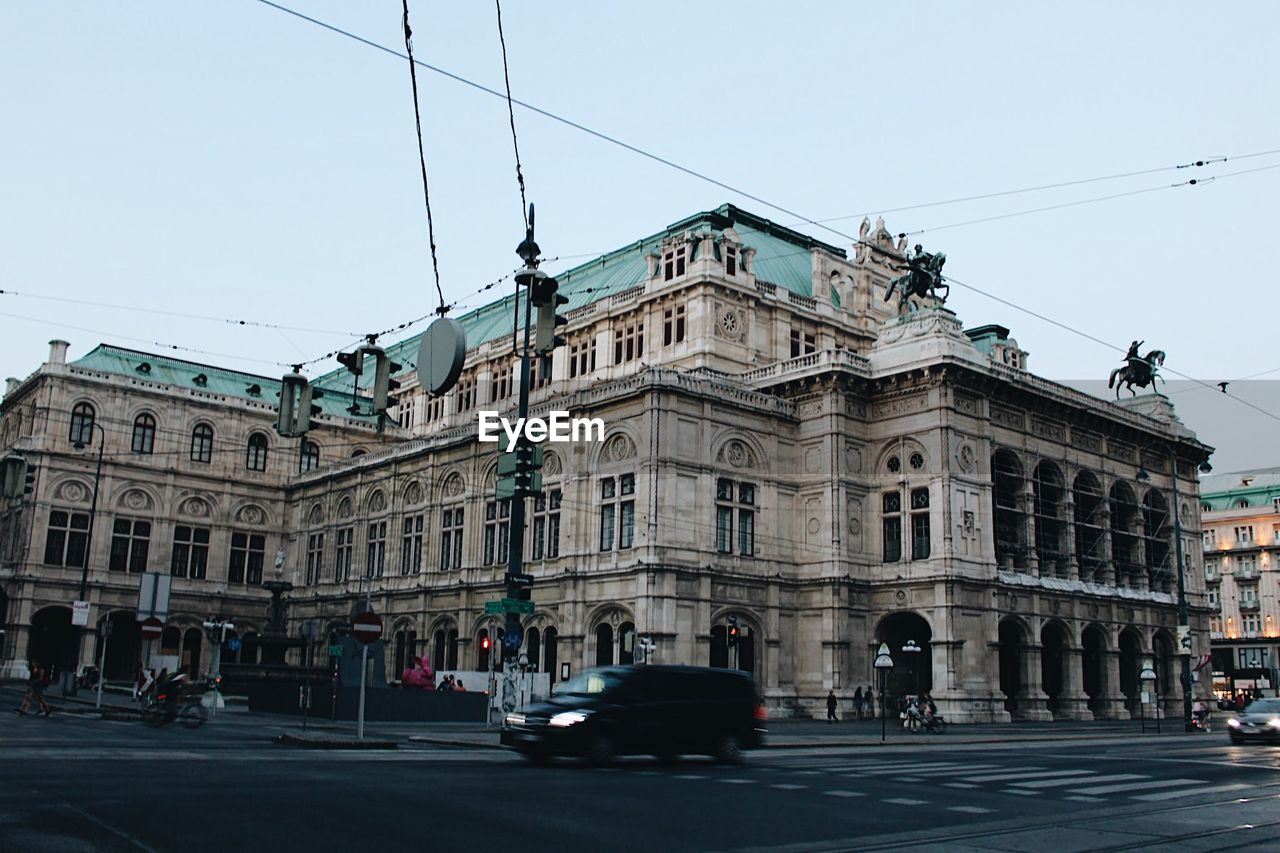 VIEW OF CITY STREET AND BUILDINGS