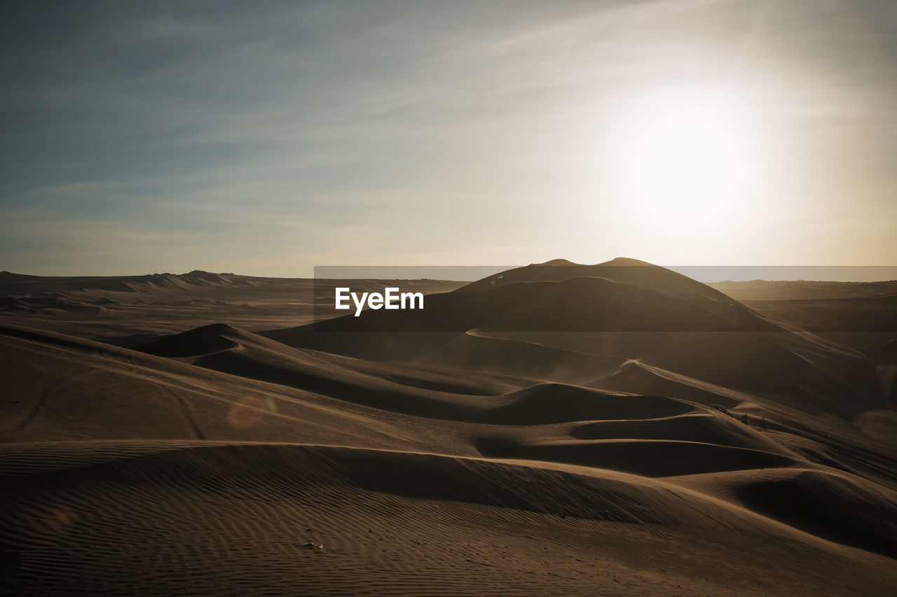 Scenic view of desert against sky