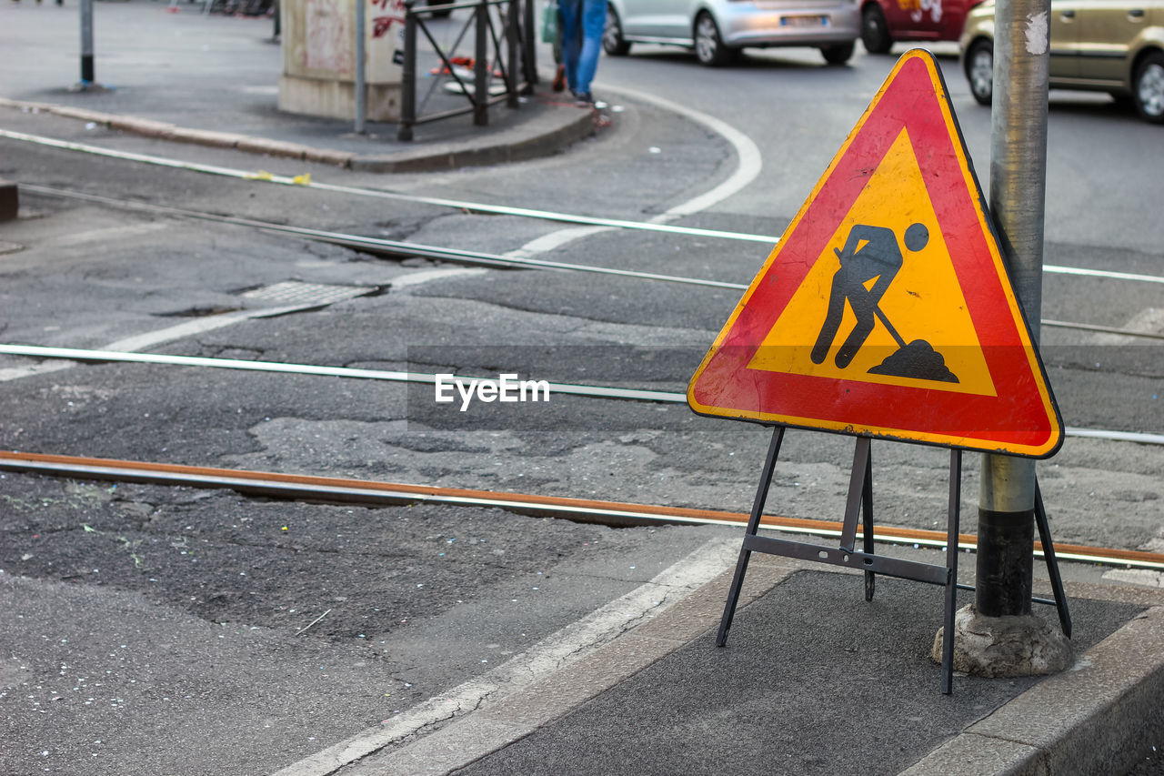 Road sign on street in city