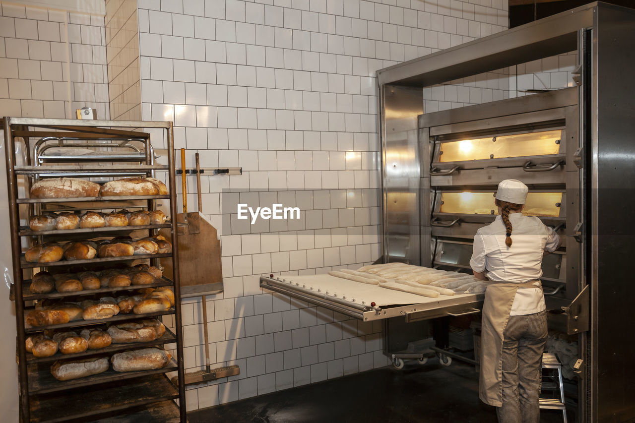 Female baker in bakery