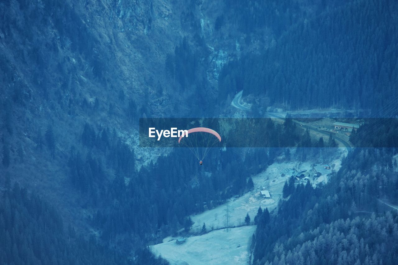 AERIAL VIEW OF SNOW AND MOUNTAIN