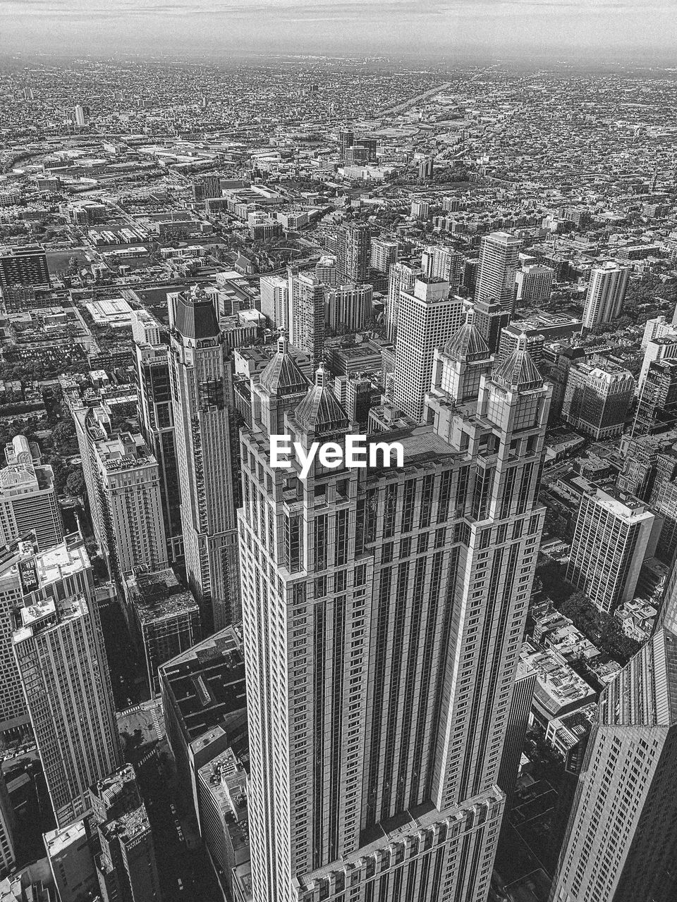 High angle view of modern buildings in city against sky