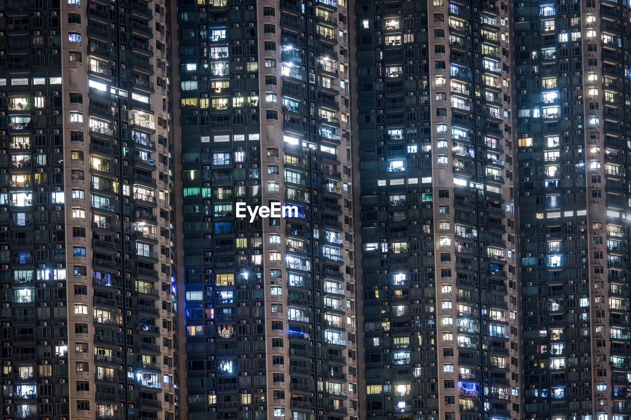 Full frame shot of illuminated buildings at night