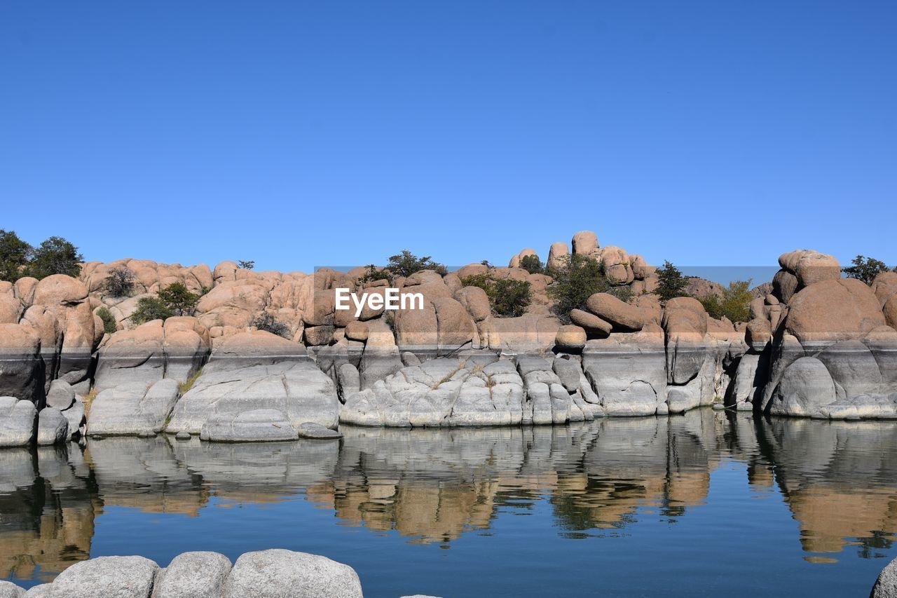 SCENIC VIEW OF ROCKS AGAINST CLEAR BLUE SKY AND ROCK FORMATIONS