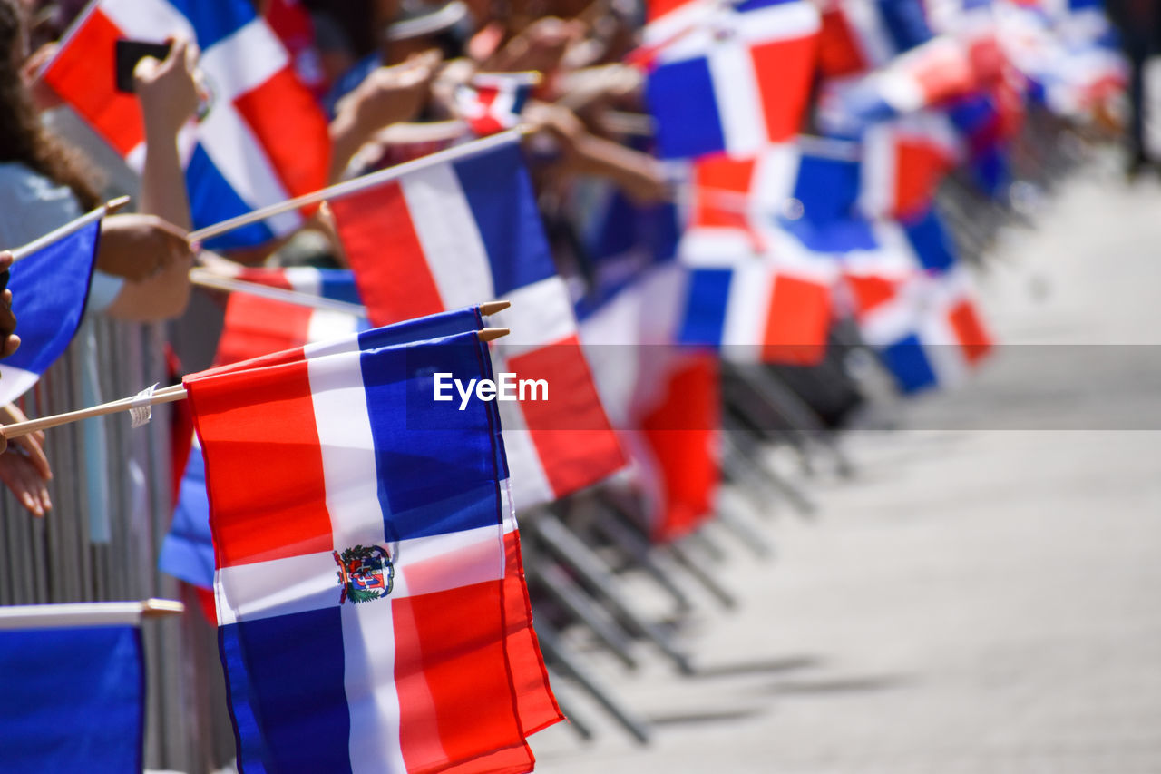 High angle view of dominican flags at the dominican day parade in new york city.