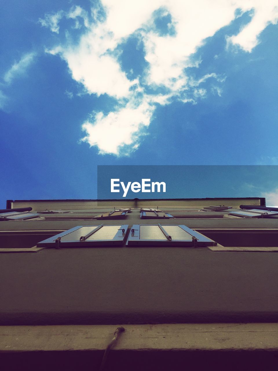 Low angle view of roof against sky