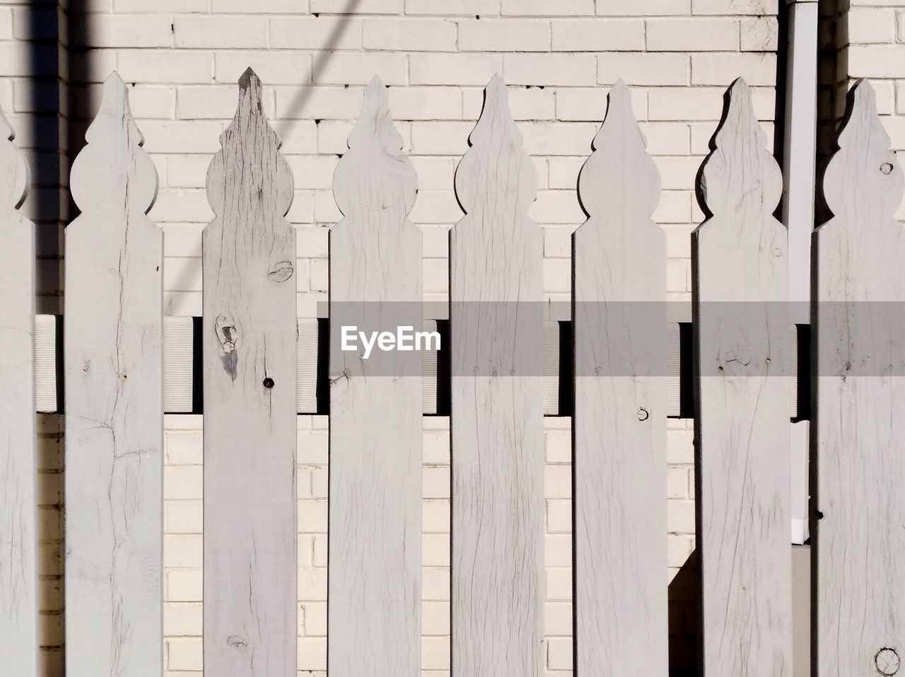 CLOSE-UP OF WOOD HANGING ON WOODEN WALL