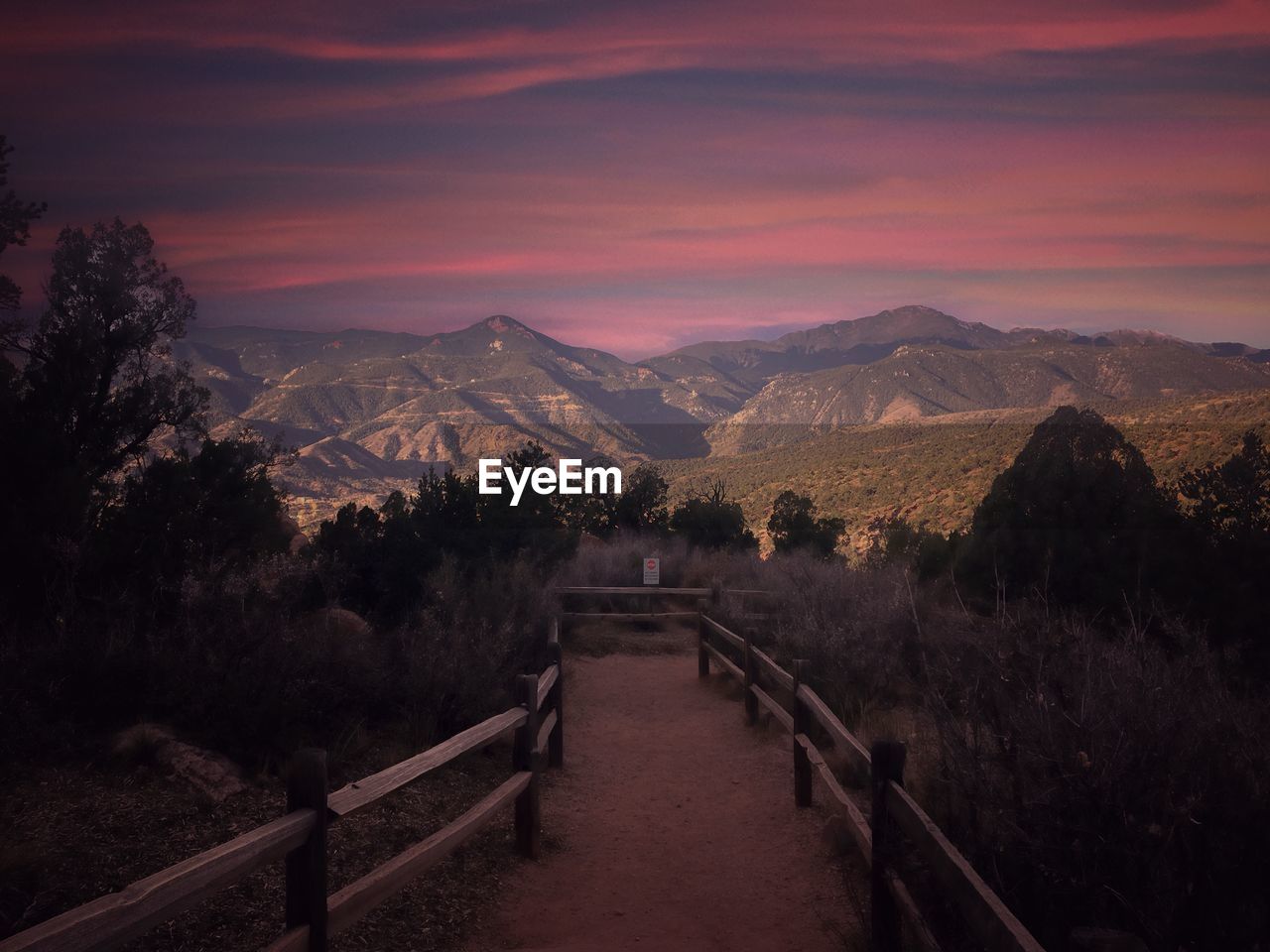 Scenic view of mountains against sky during sunset