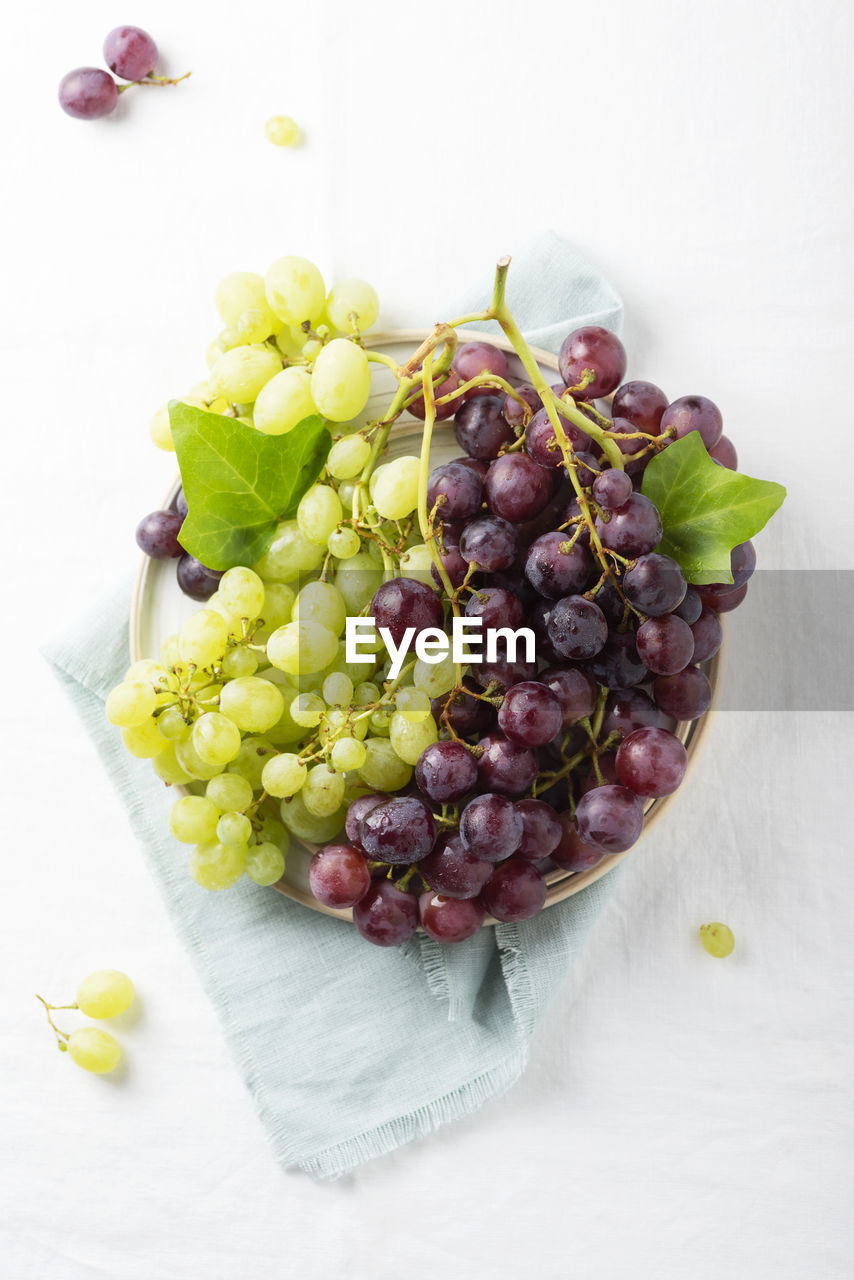 food and drink, food, healthy eating, grape, fruit, freshness, wellbeing, produce, plant, studio shot, no people, indoors, vegetable, high angle view, still life