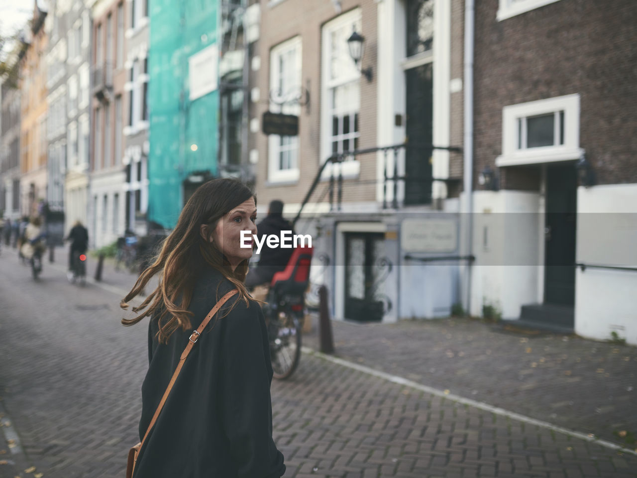 Woman walking in city