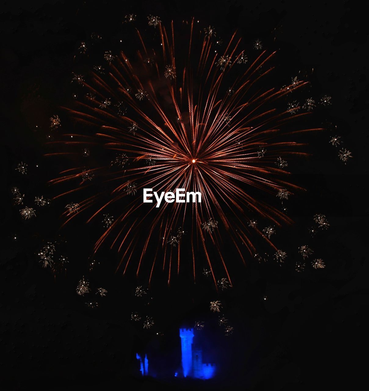 LOW ANGLE VIEW OF FIREWORK DISPLAY