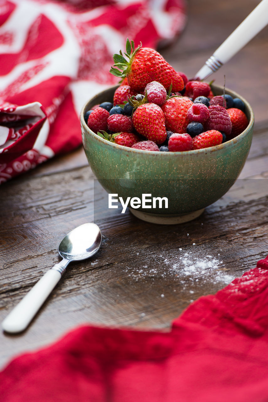 Assorted mix berry fruits in fruit bowl