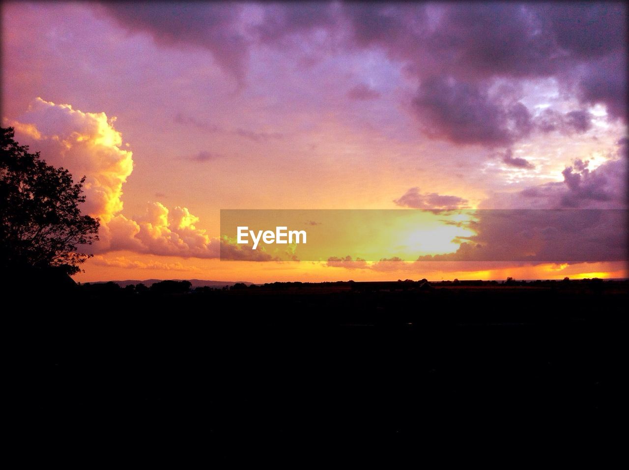 Scenic view of silhouette landscape against sky during sunset