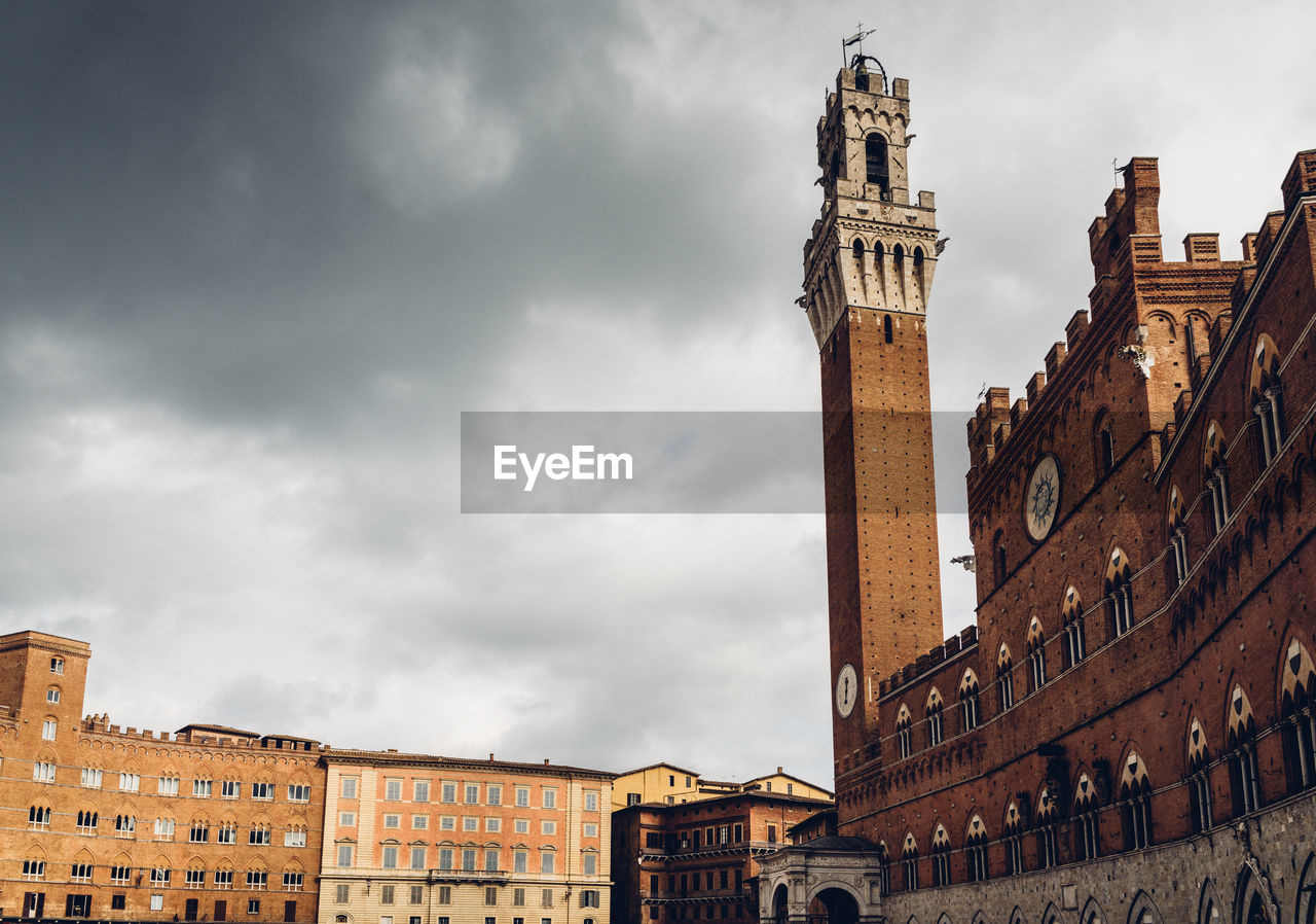 The palazzo pubblico is a palace in siena, tuscany, central italy