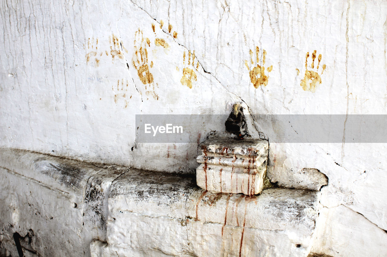 Hand prints on wall in india 