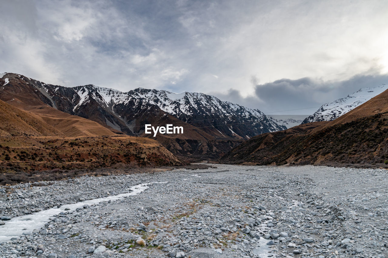 Scenic view along the mount cook road alongside with snow capped southern alps and majestic mt cook.