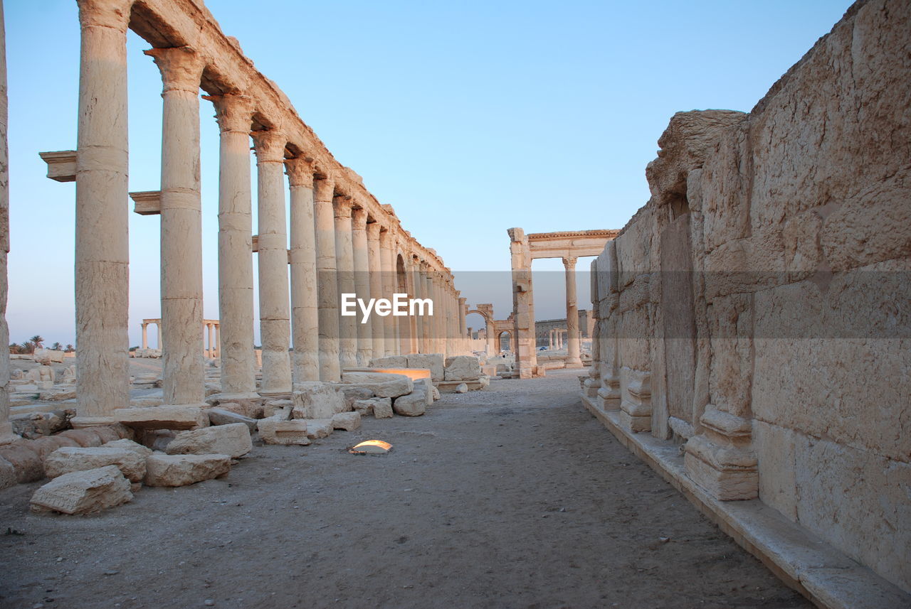 Ancient columns against clear sky