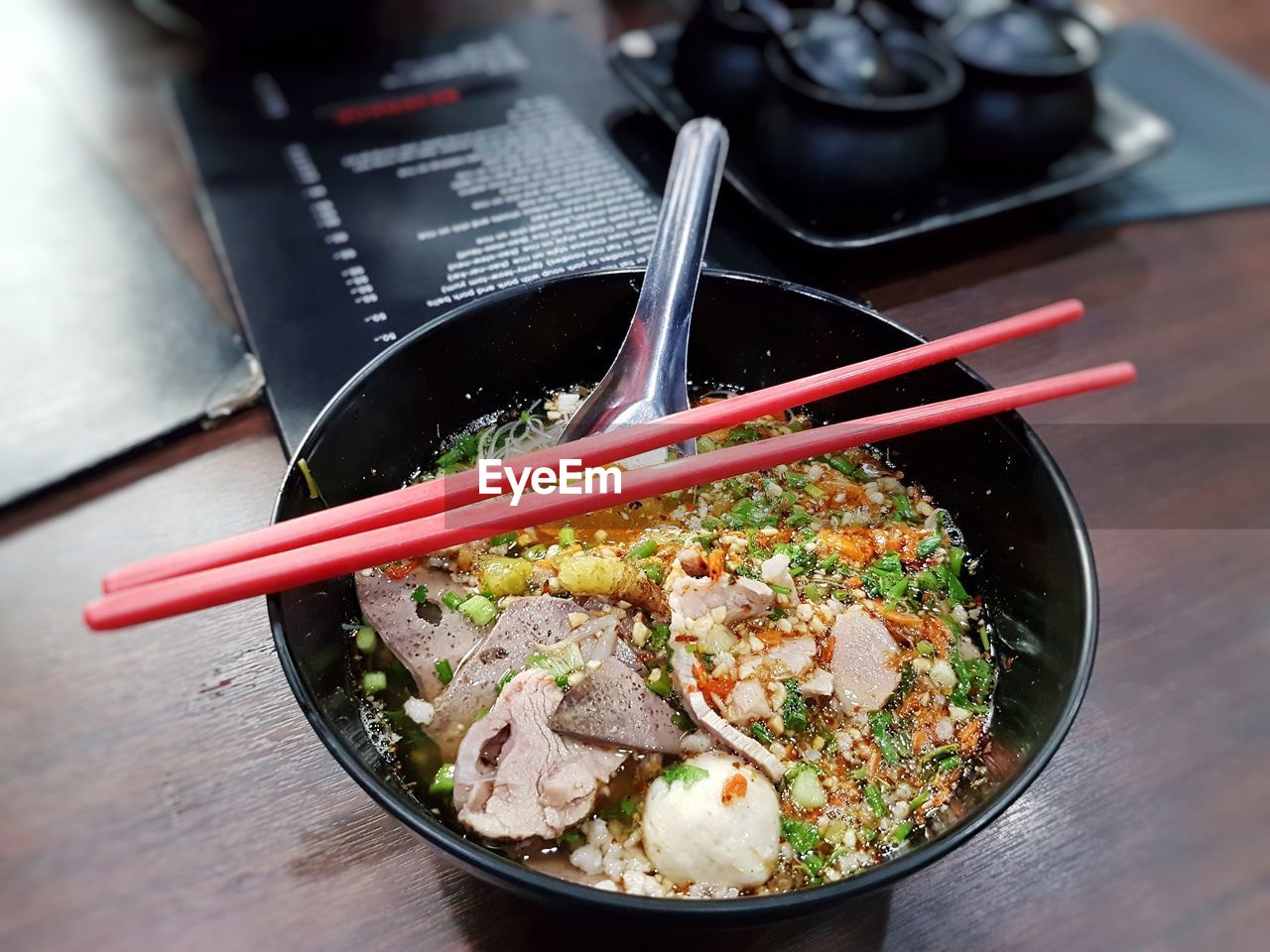 High angle view of thai noodles in bowl on table