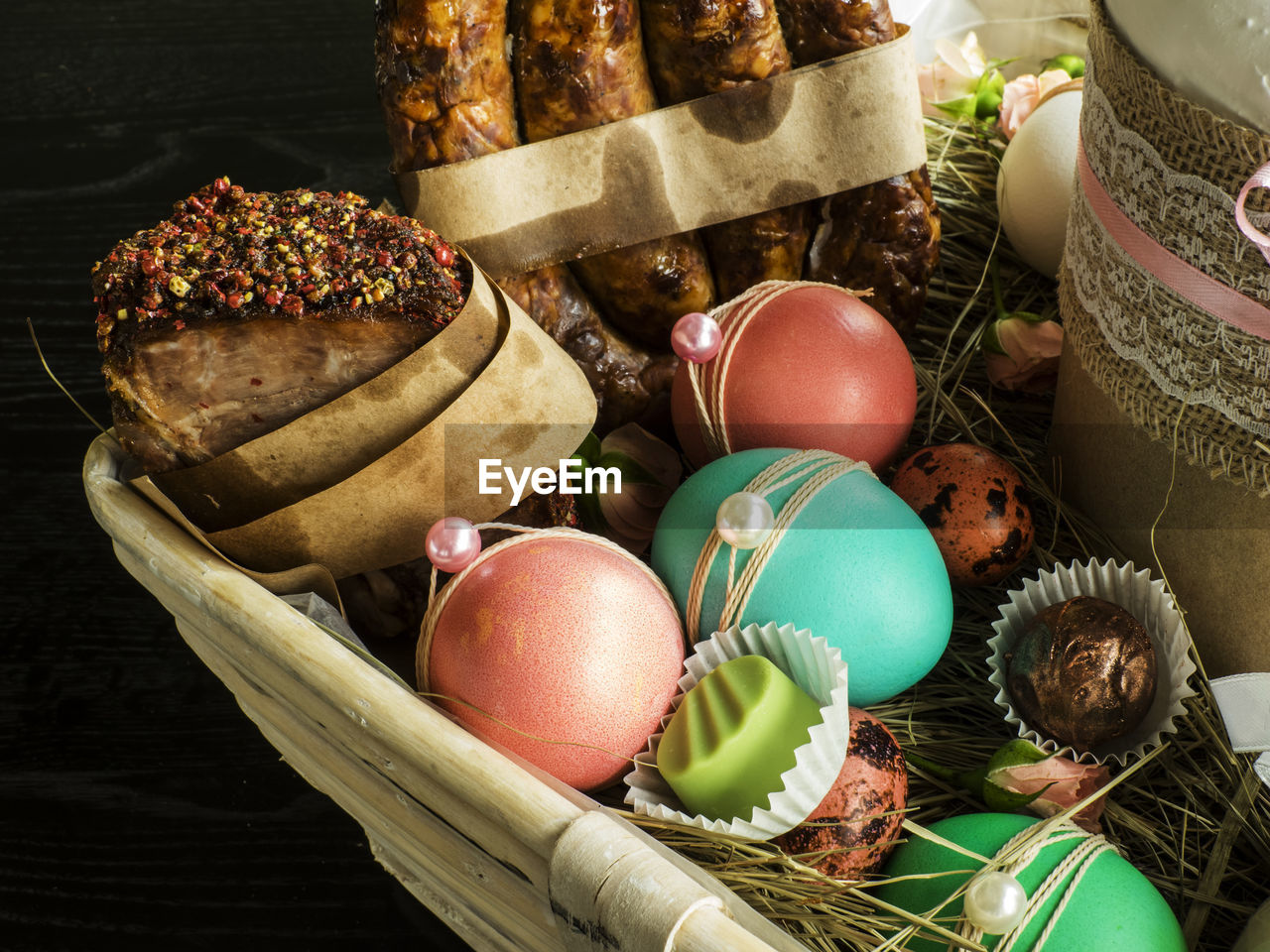 Close-up of food and decoration in easter basket