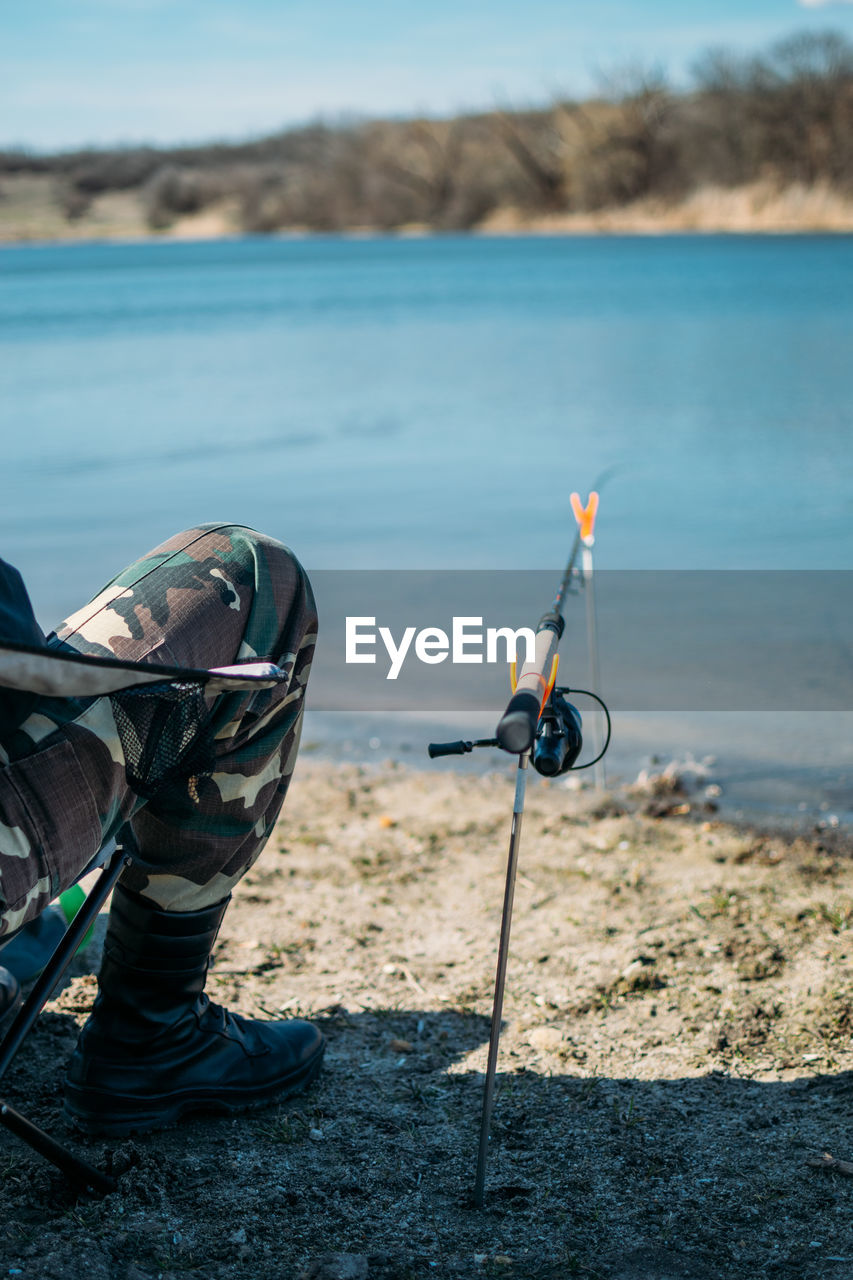 Eeder fishing. fishing reel on the rod. fisherman's reel, mounted on fishing rod