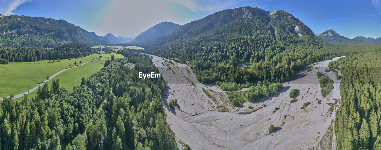 Panoramic view of landscape and mountains against sky