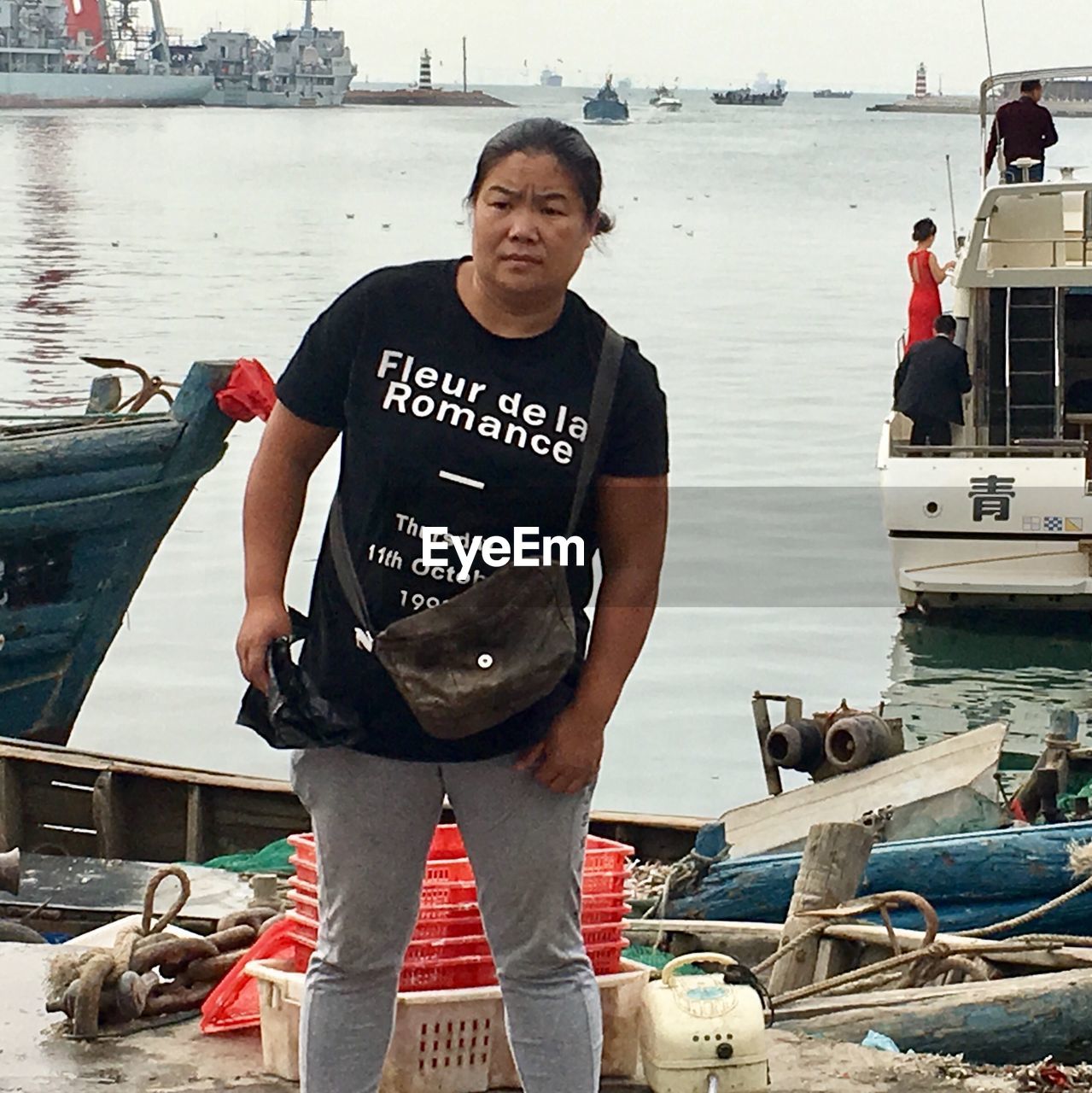 FULL LENGTH PORTRAIT OF MAN STANDING ON SEA